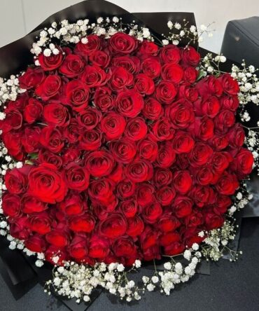 REd rose large boiuquet with white flowers.jpg